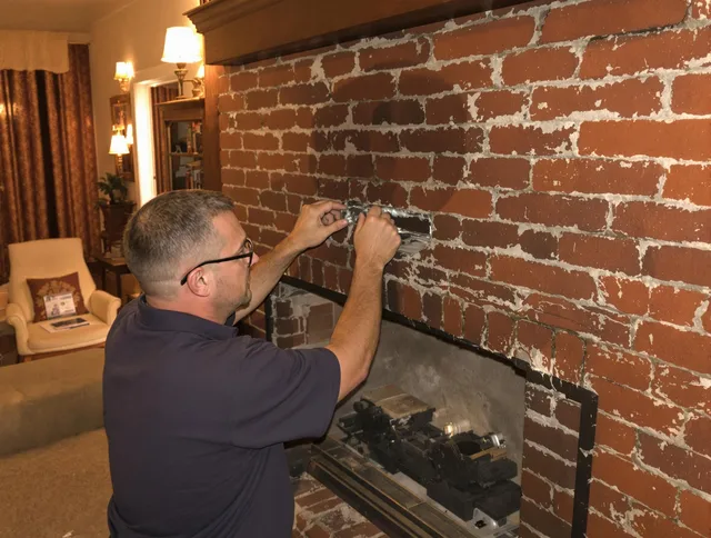Hollywood Chimney Sweep expert fixing a fireplace in Hollywood, FL
